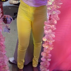 Bright yellow high waisted jeans